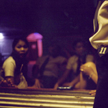 Photo: Girls in karaoke bar, Sihanoukville, Cambodia. © Mattia Insolera. Cambodian and ethnic Vietnamese women and girls are trafficked internally to Phnom Penh, Siem Reap, and Sihanoukville for forced prostitution in brothels and karaoke bars.